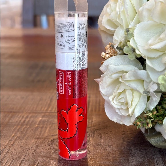 NEW Wet n Wild SESAME STREET “Tickle Me” Elmo LIP TINGLING GLOSS! - Picture 2 of 4